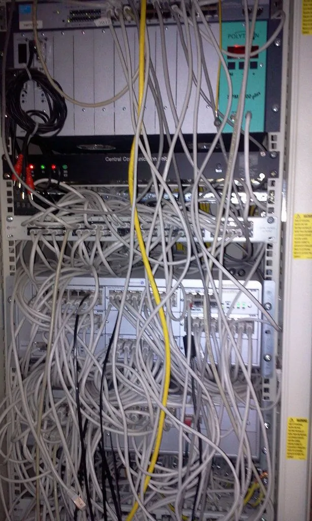 Network rack with tangled cables from my early IT administration days